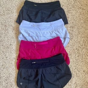 Speed Up Low-Rise Lined Short 2.5” /x4 two black, lavender, dark pink